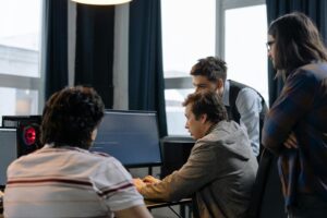 Change management in software development - group of developers working together on a project